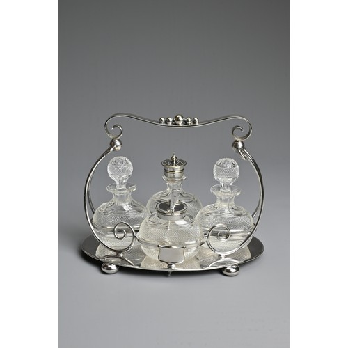 273 - AN ENGLISH SILVER PLATED CRUET SET BY MARK WILLIS & SONS, SHEFFIELD C.1910. With four glass containe... 