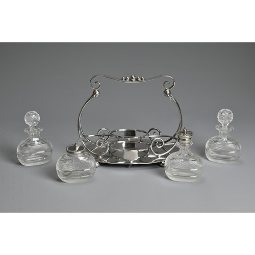 273 - AN ENGLISH SILVER PLATED CRUET SET BY MARK WILLIS & SONS, SHEFFIELD C.1910. With four glass containe... 