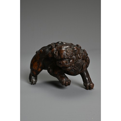 249 - JAPANESE CARVED WOOD MODEL OF A MYTHICAL BEAST, 19TH/20TH CENTURY, in prowling pose, carved with det... 