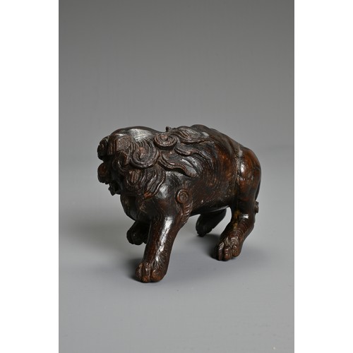 249 - JAPANESE CARVED WOOD MODEL OF A MYTHICAL BEAST, 19TH/20TH CENTURY, in prowling pose, carved with det... 