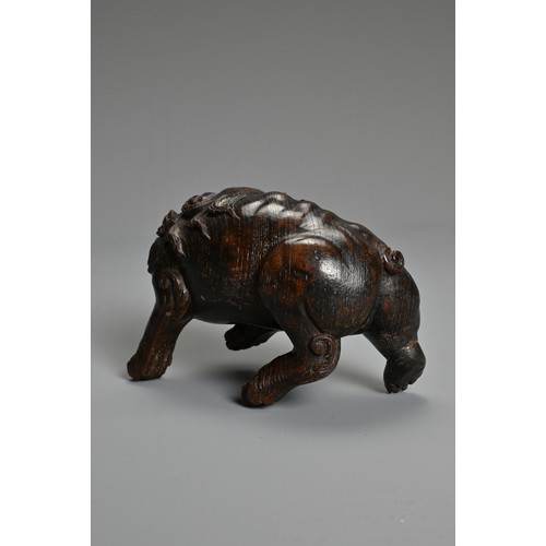 249 - JAPANESE CARVED WOOD MODEL OF A MYTHICAL BEAST, 19TH/20TH CENTURY, in prowling pose, carved with det... 