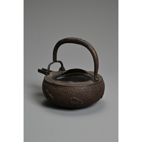 237 - A 20TH CENTURY JAPANESE CAST IRON CHOSHI (SAKE EWER), of squat form on tripod feet with black lacque... 