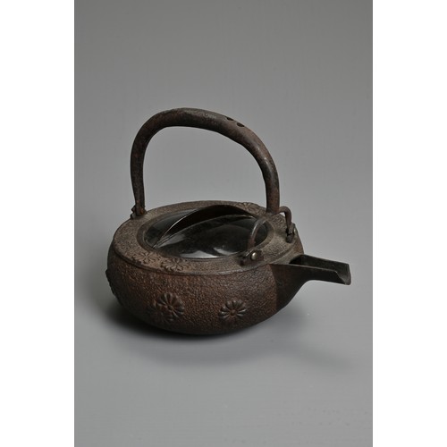 237 - A 20TH CENTURY JAPANESE CAST IRON CHOSHI (SAKE EWER), of squat form on tripod feet with black lacque... 