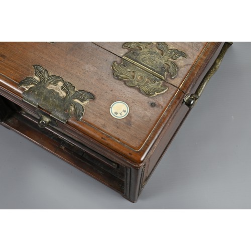 215 - A CHINESE HARDWOOD TRAVELLING VANITY CASE, 19/20TH CENTURY. Of rectangular form with metal handles a... 