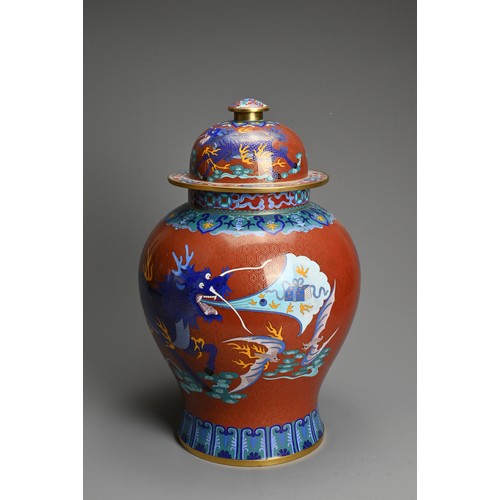 224 - A CHINESE CLOISONNÉ ENAMEL JAR WITH COVER, 20TH CENTURY, Of baluster form decorated with Qilin and o... 