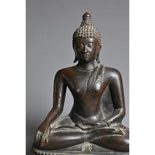 228 - A THAI BRONZE FIGURE OF BUDDHA SHAKYAMUNI, 18/19TH CENTURY. Well cast, dressed in robe seated on a s... 