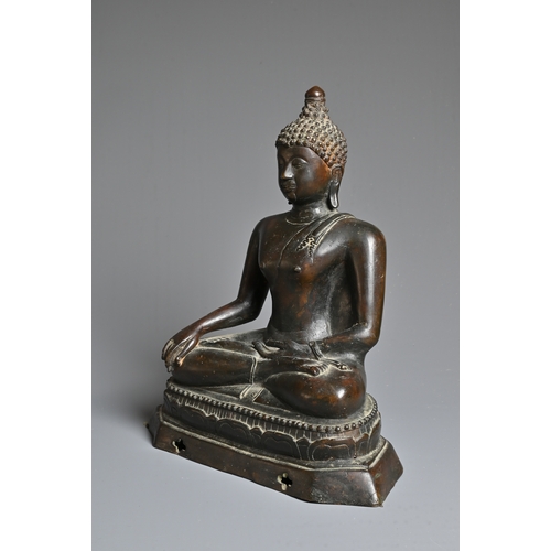 228 - A THAI BRONZE FIGURE OF BUDDHA SHAKYAMUNI, 18/19TH CENTURY. Well cast, dressed in robe seated on a s... 