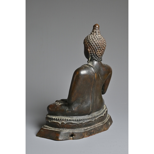 228 - A THAI BRONZE FIGURE OF BUDDHA SHAKYAMUNI, 18/19TH CENTURY. Well cast, dressed in robe seated on a s... 