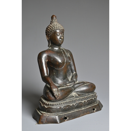 228 - A THAI BRONZE FIGURE OF BUDDHA SHAKYAMUNI, 18/19TH CENTURY. Well cast, dressed in robe seated on a s... 