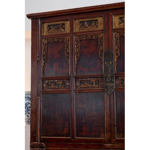 213 - CHINESE RED LACQUER CABINET, 19/20TH CENTURY. With a planked top above twin doors with two shelves a... 