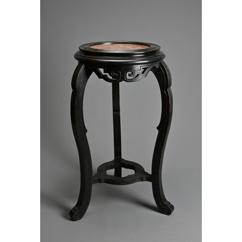 207 - A CHINESE STYLE JARDINIERE STAND WITH RED MARBLE TOP, 20TH CENTURY. On three curved scroll legs with... 