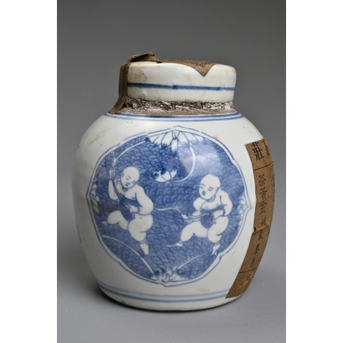 45 - A CHINESE BLUE AND WHITE PORCELAIN JAR AND COVER WITH TEA LABELS. The jar decorated with figures of ... 