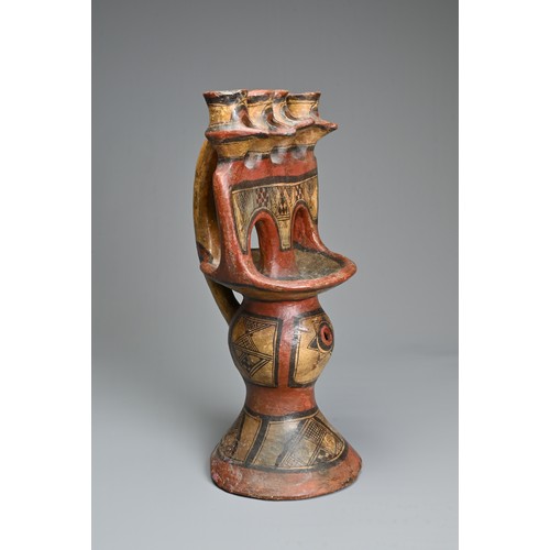 230 - A PAINTED BERBER OIL LAMP, KABYLIA ALGERIA, EARLY 20TH CENTURY. Low fired ceramic oil lamp modelled ... 