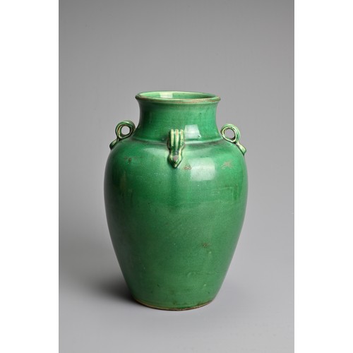 166 - A CHINESE GREEN GLAZED PORCELAIN JAR, 19/20TH CENTURY. Of ovoid form with four lug handles, covered ... 