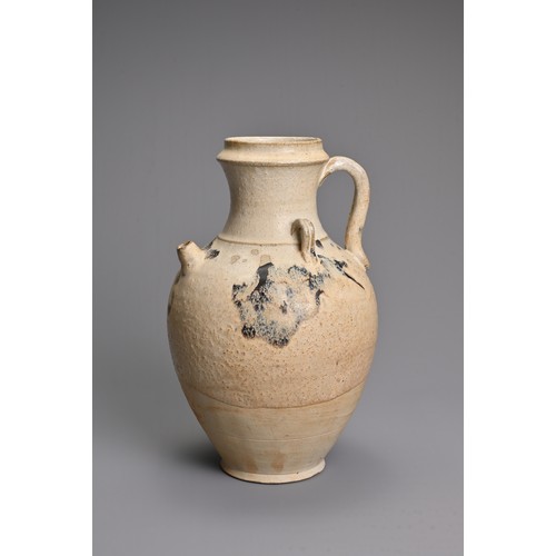 167 - A CHINESE SPLASH GLAZED STONEWARE EWER. Of ovoid form with short spout and twin looped handles to th... 