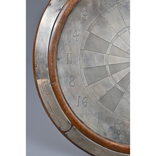 272 - A SILVER DARTBOARD TROPHY, CHARLES S. GREEN & CO, HALLMARKED, BIRMINGHAM 1935. Mounted on an oak bas... 