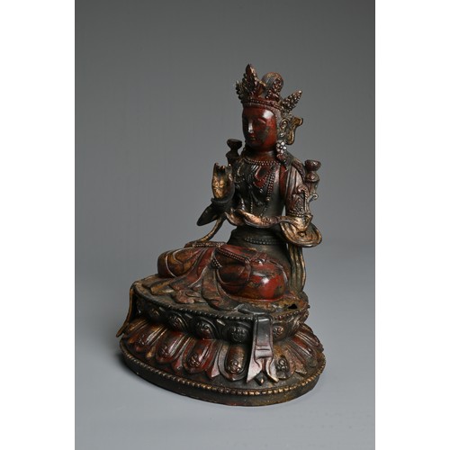 103 - A CHINESE DECORATIVE GILT AND RED LACQUER BRONZE SEATED BUDDHA. Dressed in robes adorned with jewels... 