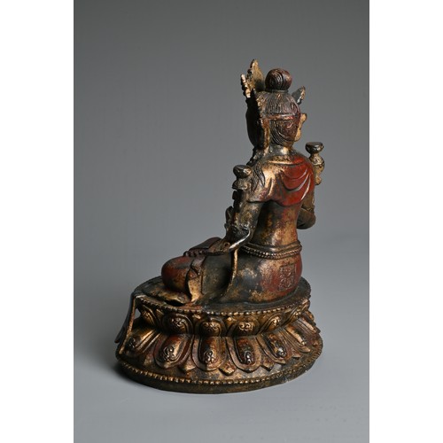 103 - A CHINESE DECORATIVE GILT AND RED LACQUER BRONZE SEATED BUDDHA. Dressed in robes adorned with jewels... 