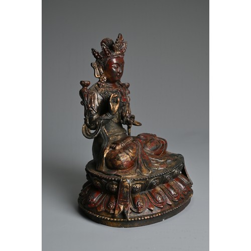 103 - A CHINESE DECORATIVE GILT AND RED LACQUER BRONZE SEATED BUDDHA. Dressed in robes adorned with jewels... 