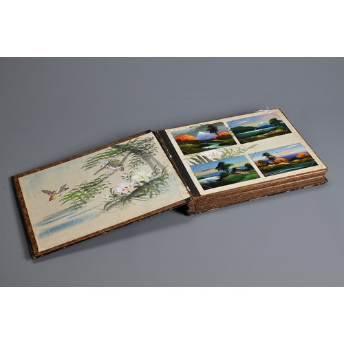 251 - A JAPANESE LACQUER PHOTOGRAPH ALBUM, EARLY 20TH CENTURY. The cover inlaid and painted featuring a bi... 