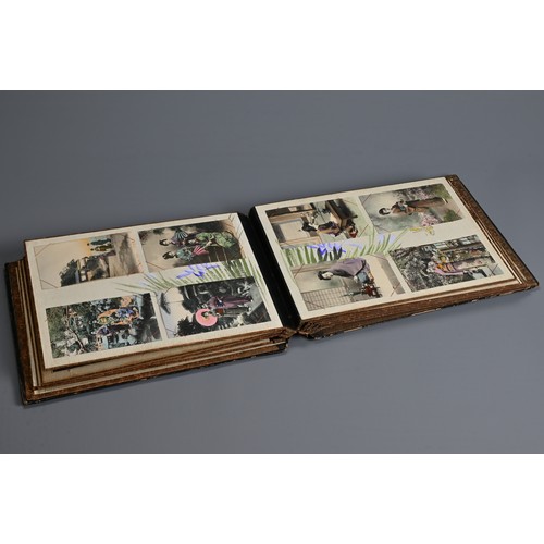 251 - A JAPANESE LACQUER PHOTOGRAPH ALBUM, EARLY 20TH CENTURY. The cover inlaid and painted featuring a bi... 