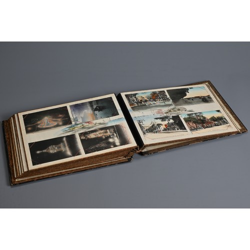 251 - A JAPANESE LACQUER PHOTOGRAPH ALBUM, EARLY 20TH CENTURY. The cover inlaid and painted featuring a bi... 