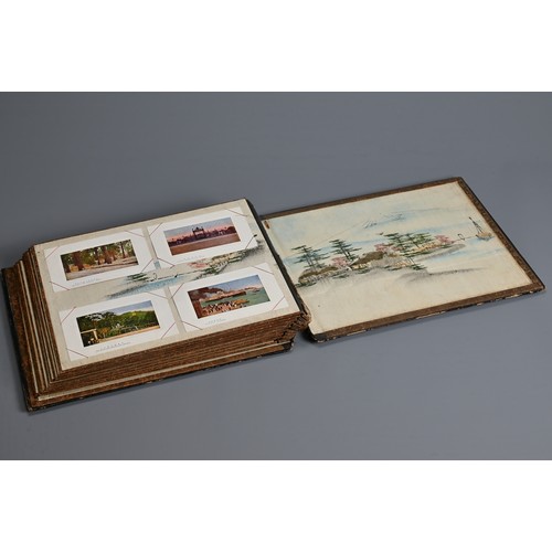 251 - A JAPANESE LACQUER PHOTOGRAPH ALBUM, EARLY 20TH CENTURY. The cover inlaid and painted featuring a bi... 