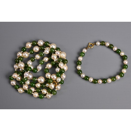 278 - A VINTAGE JADE AND PEARL BEAD NECKLACE. Alternating jade beads with graduating pearls; Together with... 