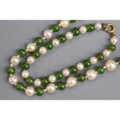 278 - A VINTAGE JADE AND PEARL BEAD NECKLACE. Alternating jade beads with graduating pearls; Together with... 