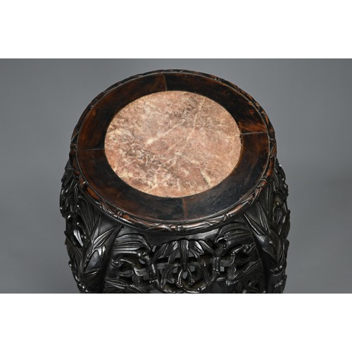 208 - A CHINESE HARDWOOD JARDINIERE STAND, 19/20TH CENTURY. Carved in relief with s shaped faux bamboo leg... 