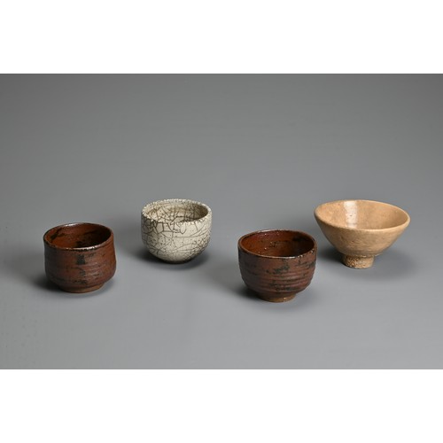 239 - FOUR JAPANESE SETO TYPE POTTERY BOWLS, 19/20TH CENTURY. To include two brown bowls each with a wax s... 