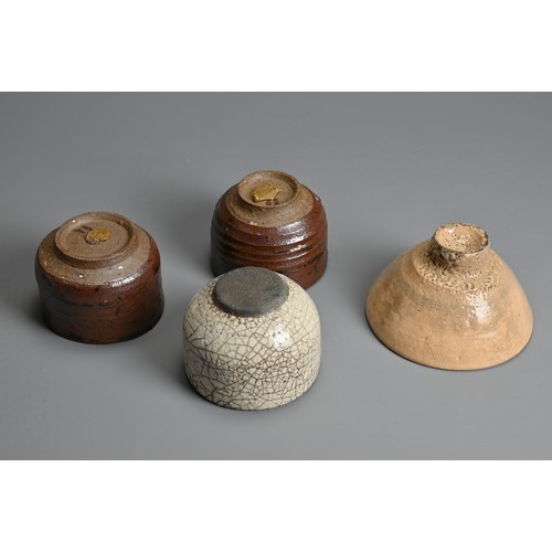 239 - FOUR JAPANESE SETO TYPE POTTERY BOWLS, 19/20TH CENTURY. To include two brown bowls each with a wax s... 