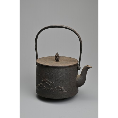 236 - A JAPANESE CAST IRON TEAPOT, EARLY 20TH CENTURY. Of cylindrical form with handle, widening at the ba... 