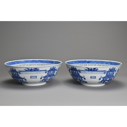 1 - A LARGE PAIR OF CHINESE BLUE AND WHITE PORCELAIN BOWLS, LATE 19TH CENTURY. Each decorated with build... 