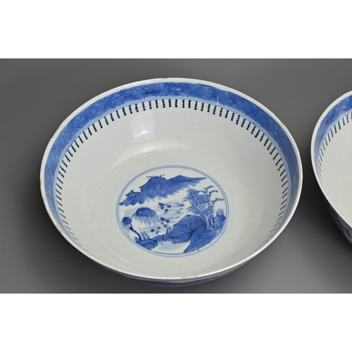 1 - A LARGE PAIR OF CHINESE BLUE AND WHITE PORCELAIN BOWLS, LATE 19TH CENTURY. Each decorated with build... 