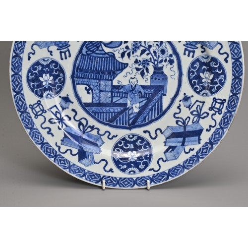 3 - A LARGE CHINESE BLUE AND WHITE PORCELAIN DISH, 18TH CENTURY. The interior roundel depicting a boy on... 