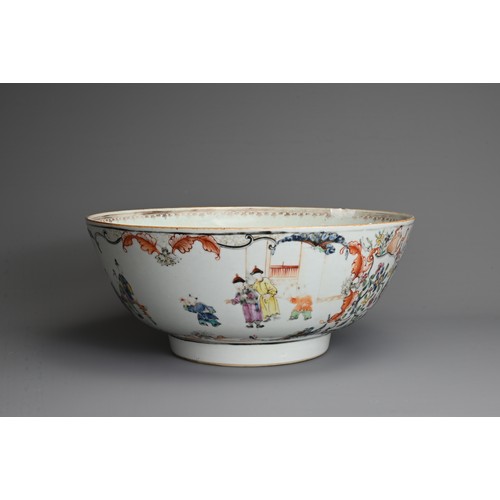 12 - A CHINESE FAMILLE ROSE PORCELAIN PUNCH BOWL, 18TH CENTURY. Decorated with figures in a courtyard sce... 