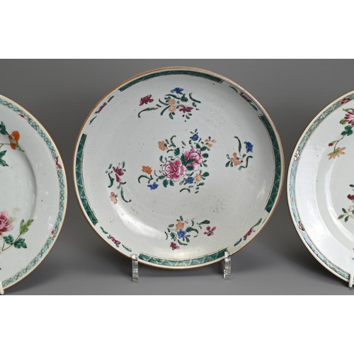 34 - THREE CHINESE FAMILLE ROSE DISHES, 18TH CENTURY. To include a pair of dishes decorated with floral s... 