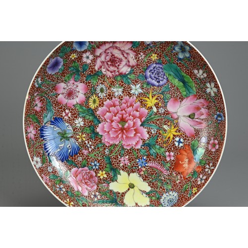 41 - A CHINESE MILLEFLEUR DECORATED DISH, EARLY 20TH CENTURY. With rounded sides decorated to the interio... 