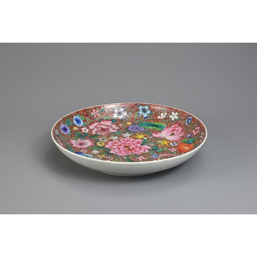 41 - A CHINESE MILLEFLEUR DECORATED DISH, EARLY 20TH CENTURY. With rounded sides decorated to the interio... 