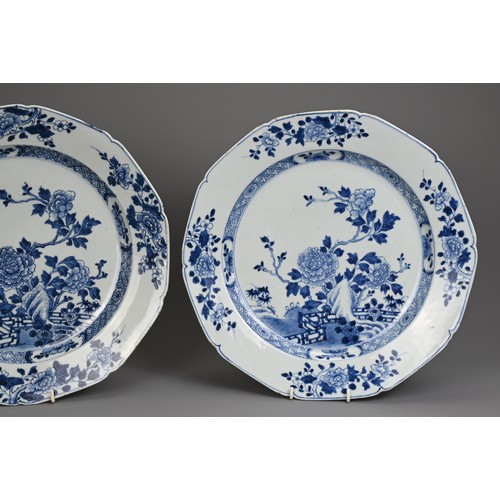 46 - TWO LARGE CHINESE BLUE AND WHITE PORCELAIN DISHES, 18TH CENTURY. With lobed sides decorated with flo... 