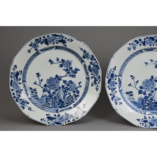 46 - TWO LARGE CHINESE BLUE AND WHITE PORCELAIN DISHES, 18TH CENTURY. With lobed sides decorated with flo... 