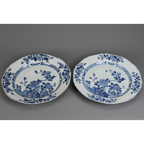 46 - TWO LARGE CHINESE BLUE AND WHITE PORCELAIN DISHES, 18TH CENTURY. With lobed sides decorated with flo... 