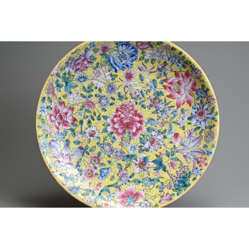 55 - A LARGE CHINESE MILLEFLEUR DECORATED PORCELAIN DISH, 20TH CENTURY. Decorated with various floral blo... 