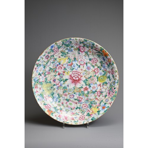 56 - A LARGE CHINESE MILLEFLEUR DECORATED PORCELAIN DISH, EARLY 20TH CENTURY. Decorated with various flow... 