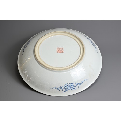 56 - A LARGE CHINESE MILLEFLEUR DECORATED PORCELAIN DISH, EARLY 20TH CENTURY. Decorated with various flow... 