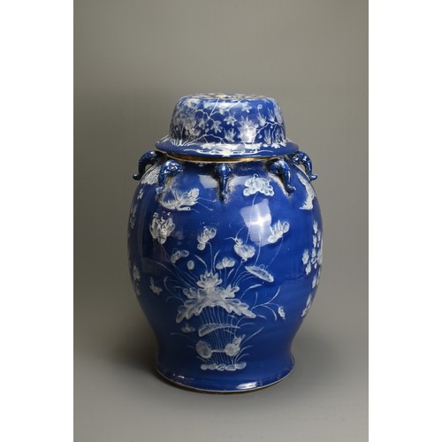 61 - A LARGE CHINESE BLUE AND WHITE PORCELAIN JAR AND COVERS, 19/20TH CENTURY. White enamel on a blue gro... 