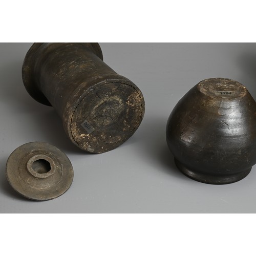 210 - THREE RARE CHINESE BURNISHED BLACK POTTERY JARS, YUAN DYNASTY (1279 – 1368). Comprising two tall cyl... 