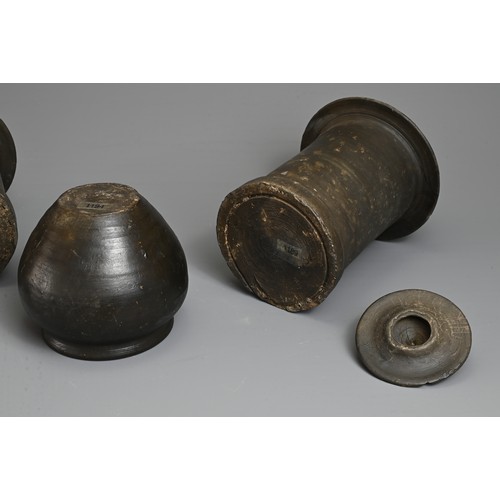 210 - THREE RARE CHINESE BURNISHED BLACK POTTERY JARS, YUAN DYNASTY (1279 – 1368). Comprising two tall cyl... 