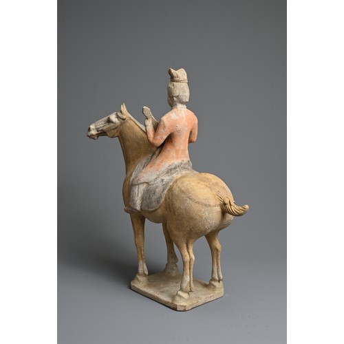 206 - A CHINESE PAINTED POTTERY HORSE WITH MUSICIAN, TANG DYNASTY (618-907). The horse standing four squar... 